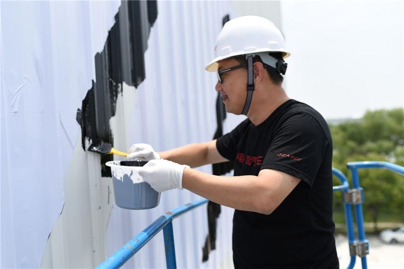 爆料！知名车企高层集体刷墙所为何事？